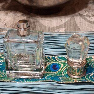 Near empty bottle of Peace Love and Juicy Couture